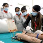 Students of Tech Mahindra SMART Academy for Healthcare interacting with the faculty and getting practical training.